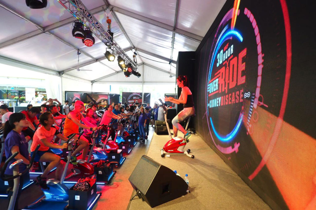 Participants enjoying an exciting exercise experience at the NKF 30 Hour Override Kidney Disease cycling event.